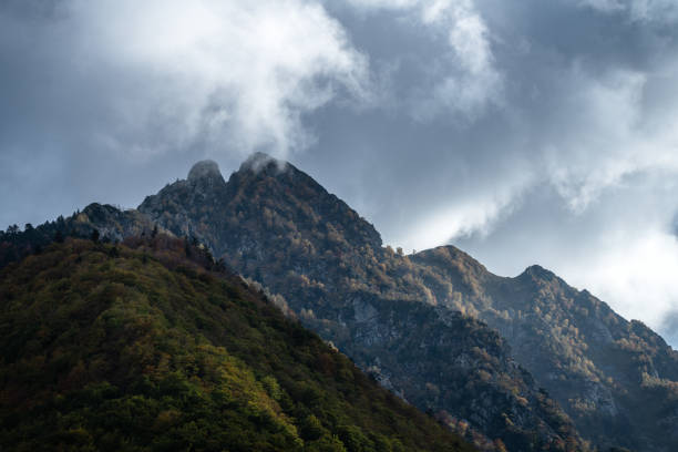 Free Stock Photo of Mysterious mountains under a stormy sky | Download ...