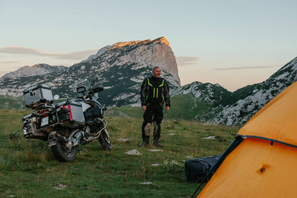 istock Man enjoying nature while camping in mountains 1438012262