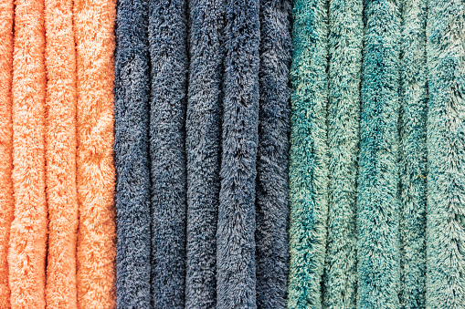 Texture of woolen cloth, colored background.