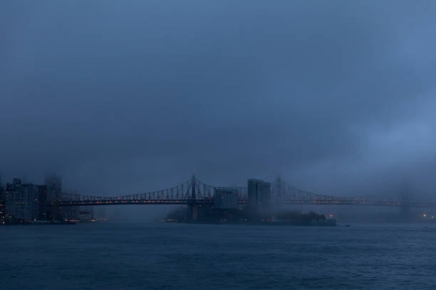 Queensboro Bridge under heavy fog in NYC