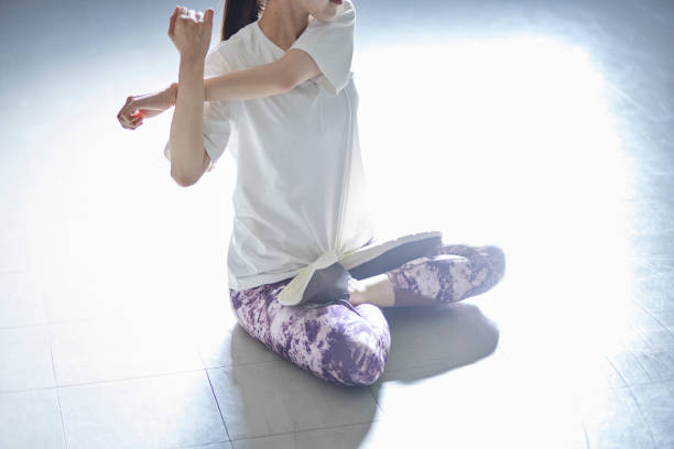 istock Young Japanese woman doing stretching 1438017558