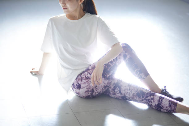 istock Young Japanese woman doing stretching 1438017563