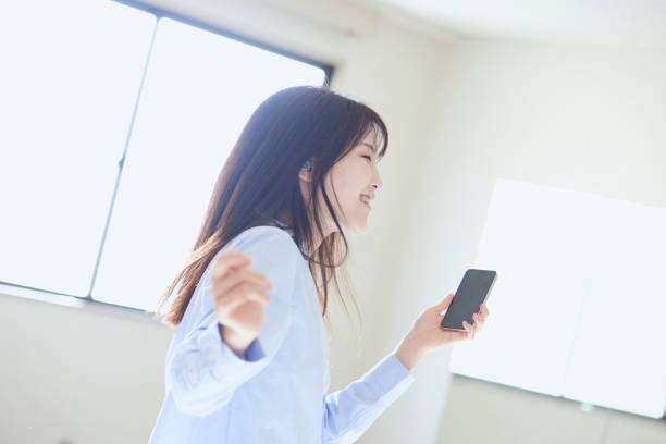 istock Young Japanese woman dancing 1438017571