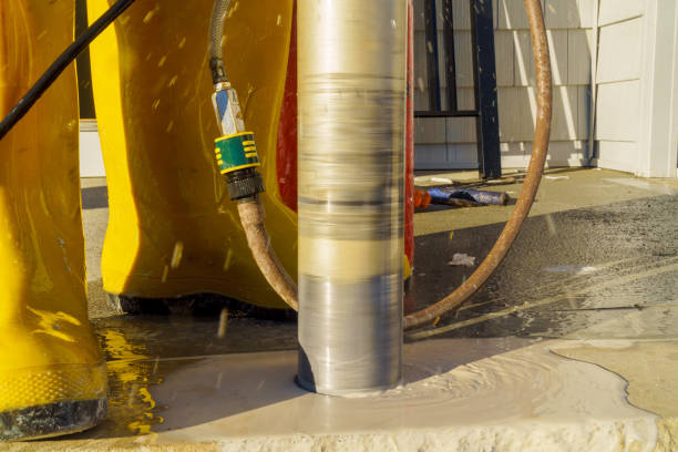 istock In a construction site, an industrial drilling machine is used to drill a hole into concrete 1438018859