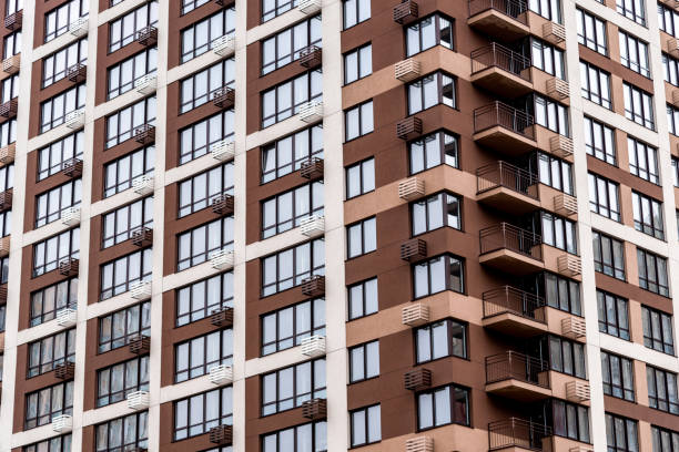 istock modern high-rise residential building close-up full frame 1438019875