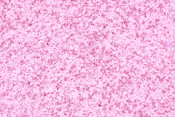istock Pink granite natural stone, textured natural surface background 1438021503