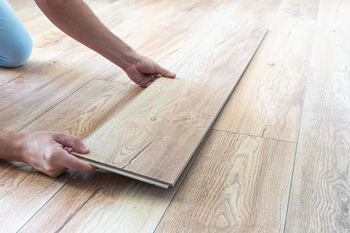 color selection for floor and laying laminate flooring. repair of parquet floor.