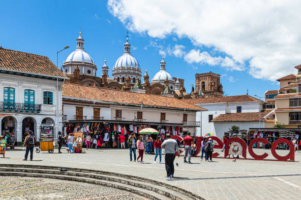 San Francisco Plaza  in historical center of city Cuenca, Ecuador Cuenca, Ecuador - August 12, 2022: San Francisco Plaza (square) in historical center of city Cuenca, UNESCO world heritage site, city name sign "Cuenca" with view of Cathedral at background cuenca ecuador stock pictures, royalty-free photos & images