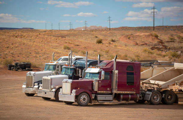 istock Several trucks parked on a resting area gas station in Utah 1438032180