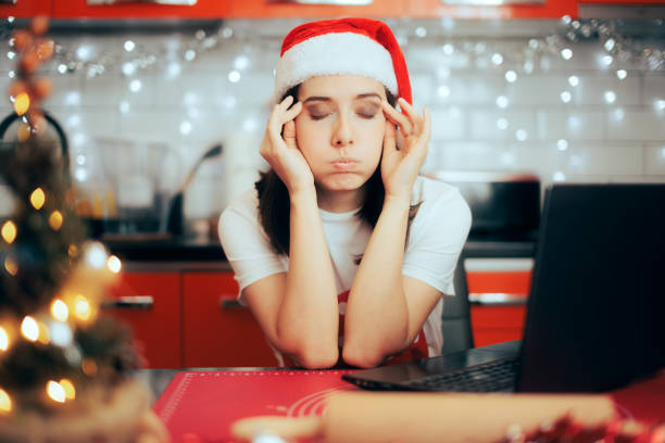 Stressed Woman Checking her laptop for an Online Video Recipe