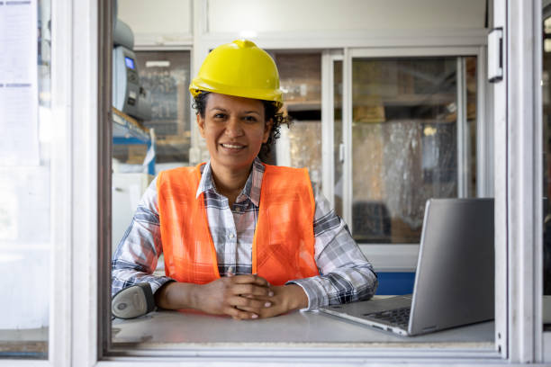 istock Happy woman working at a distribution warehouse 1438033296