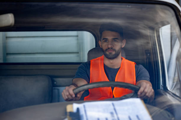 istock Driver driving freight transportation truck 1438033333