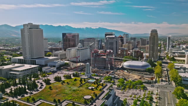 Salt Lake City Utah Skyline at Day, Mountains Behind, Aerial Drone