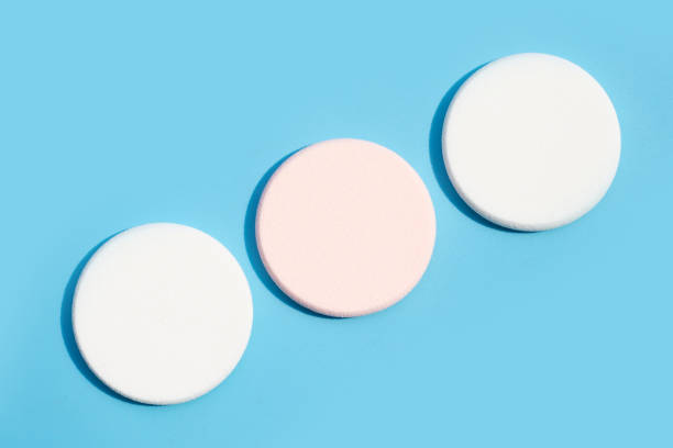 istock Sponge for face make-up cleaning on blue background 1438041873