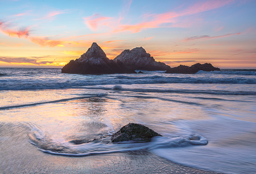 Sunset at Ocean Beach during blue hour by Sutro Bath