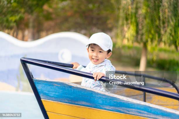 A Chinese Baby Stock Photo - Download Image Now - Amusement Park, Asia, Outdoors