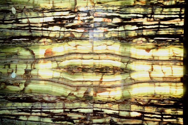 istock texture the natural stone pattern on the wall is like awood grain pattern of brown and black color 080.jpg 1438044786