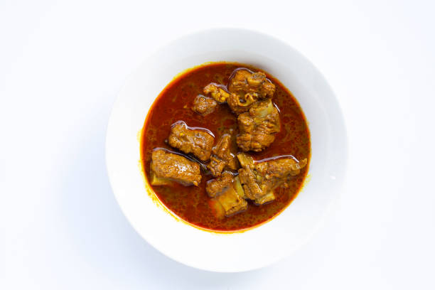 istock Spicy stir fried pork sparerib with Thai Southern chili paste on white 1438045118