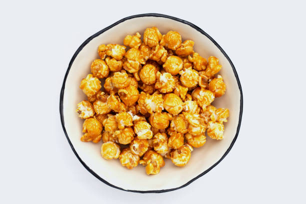 istock Honey caramel popcorn on white background. 1438051156