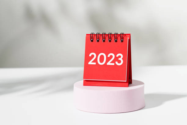 istock Calendar 2023 on pink podium with white background. 1438056399