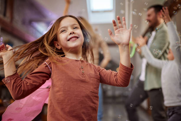 istock Cheerful girl having fun at home. 1438069129