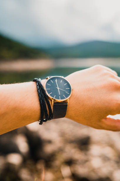 istock Vertical shot of a man wearing a watch 1438072473