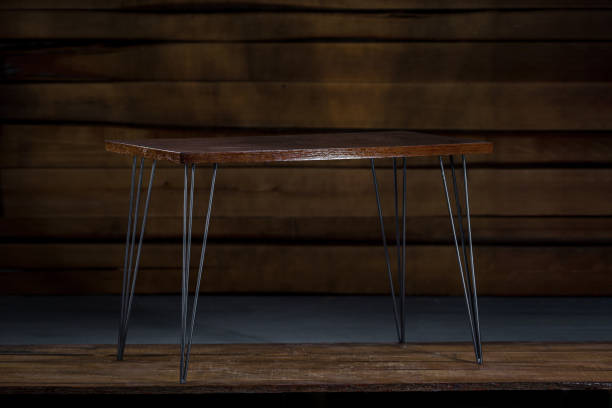 istock Wooden coffee table with metals legs in the carpenter's workshop 1438078636