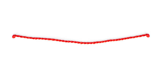 thin red string or rope with knots isolated on white - yarn ball imagens e fotografias de stock