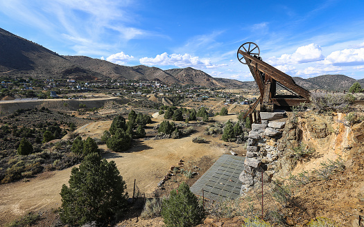 Virginia City, Nevada, United States – May 18, 2018: The headframe of the Combination Mine overlooks the mountain mining town of Virginia City.