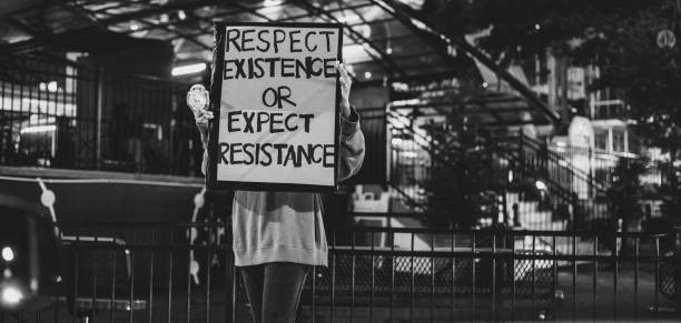 Blurred images of people protesting in the city centre, Slovenia, Europe. Nikon D850.