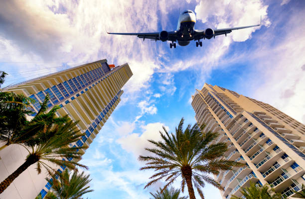 istock Airplane flying to Miami. 1438081986