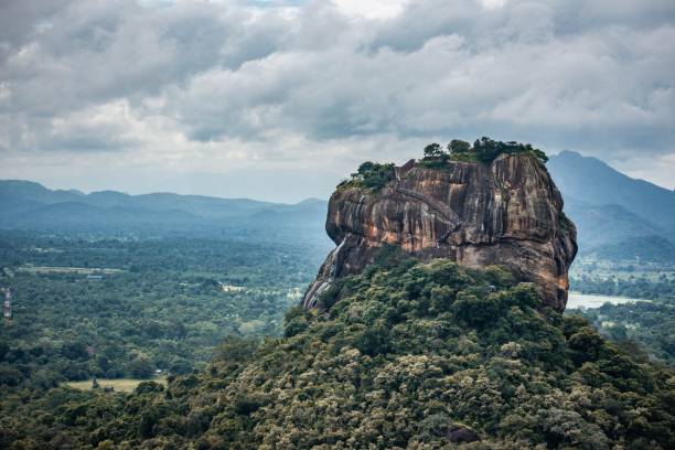istock Sigiriya rock surrounded by green lush trees in Sri Lanka 1438085873