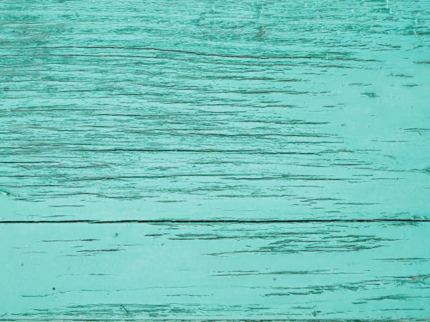 istock Wooden texture with turquoise paint 1438085880