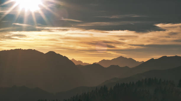 istock Landscape of mountains towards sunset 1438090011