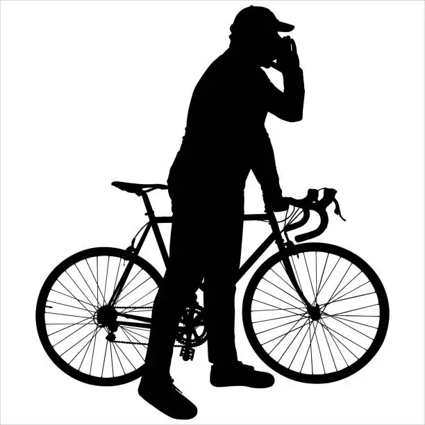 Vector illustration of A cyclist in a cap holds his bike behind the wheel. The man calls raised his hand to his mouth and calls someone. Side view of both the bike and the person. Black male silhouette isolated on white