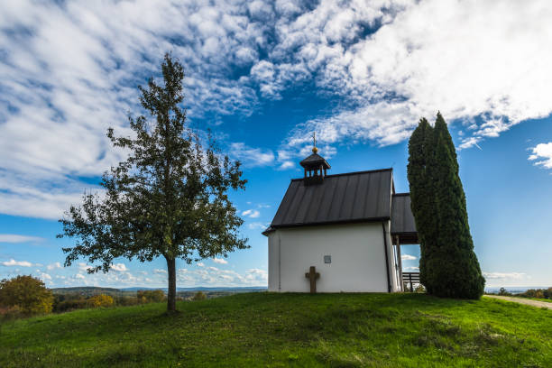 istock Small chapel on a hill in sunny autumn 1438091776