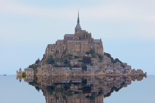 famous abbey of mont saint michel in the north of france at high tide