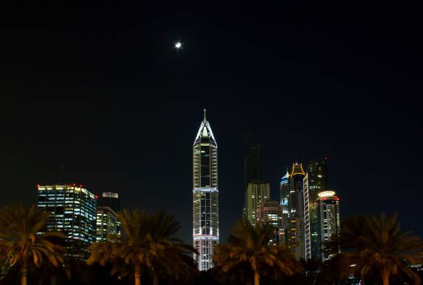 Futuristic skyscrapers in Dubai marina with Torch tower, that suffered from fire in 2015 and 2017, United Arab Emirates.
