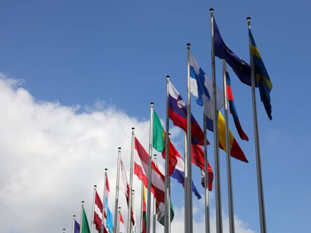 istock international flags flying during the international meeting 1438093769