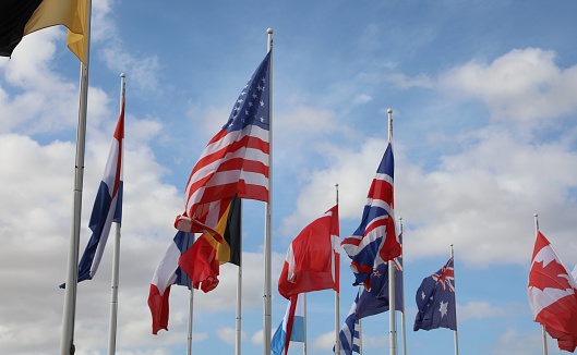 many international flags flying during the international meeting