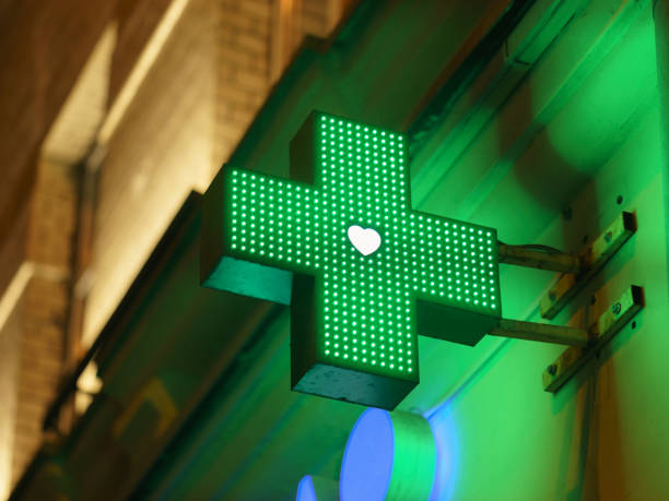Photography of a green cross outdoors stock photo