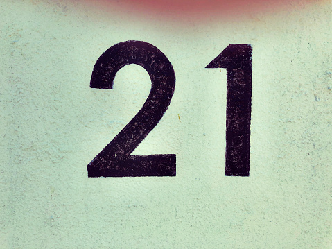 Weathered grunge square metal enameled plate of number of street address with number 216