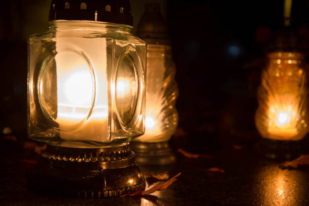 istock Votive candle at a cemetery 1438104484