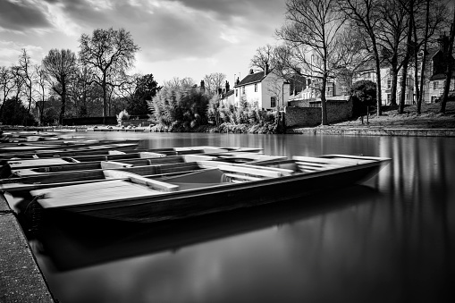 Long exposure of Cambridge punts on the River Cam.