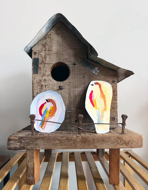 istock Antique Rustic Birdhouse with Handmade Decorations 1438110906
