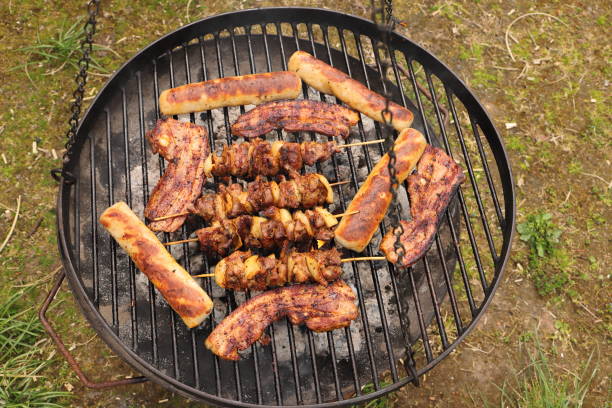 istock various meat and sausages on the charcoal grill 1438112521