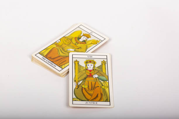 istock Deck of tarot cards on a table 1438112811