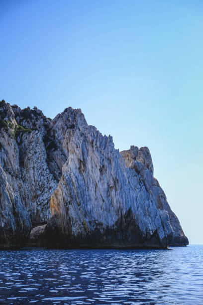 istock Ocean waves hitting the rocky cliffs - great for wallpapers 1438113070