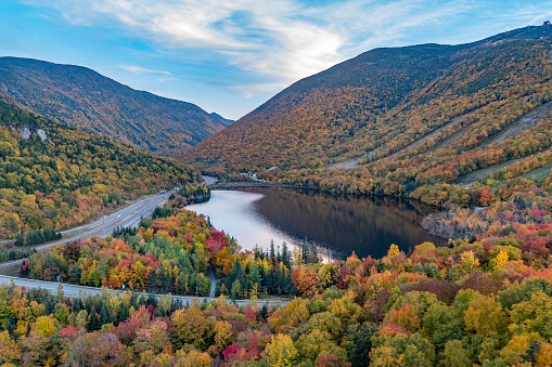 Beautiful shot of Echo lake and colorful fall foliage in Franconia Notch Park, New Hampshire