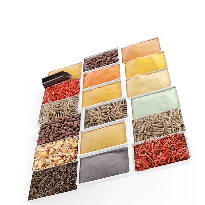 An angled shot of various 3d rendered spices in trays isolated on a white background
